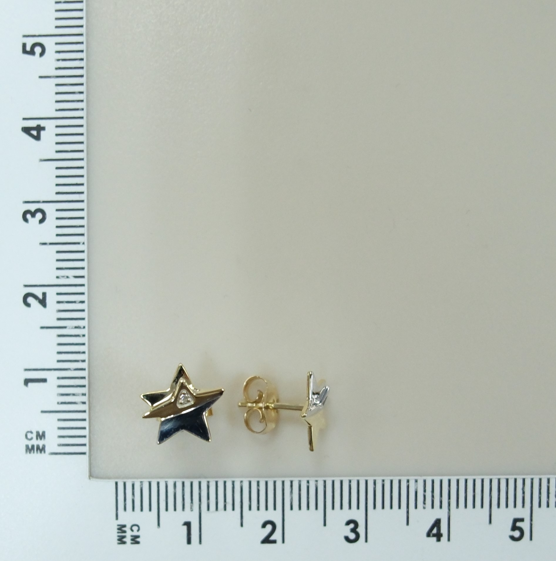 Серьги-пусеты из желтого золота с бриллиантами "Звезды"